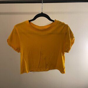 FREE PEOPLE gold tee-shirt